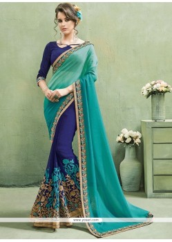 Innovative Navy Blue And Sea Green Brasso Half N Half Saree