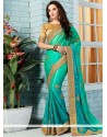 Flawless Sea Green Patch Border Work Faux Crepe Designer Saree