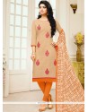 Vibrant Print Work Cream And Orange Churidar Suit