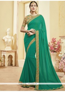 Blooming Faux Georgette Sea Green Patch Border Work Classic Saree