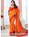 Picturesque Orange Woven Work Crepe Silk Traditional Designer Saree