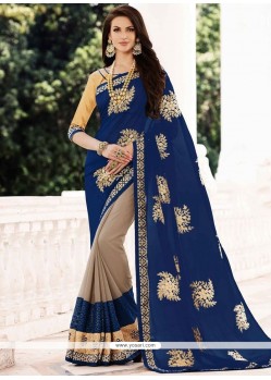 Amusing Faux Georgette Lace Work Designer Half N Half Saree