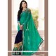 Fashionable Faux Georgette Navy Blue And Sea Green Designer Half N Half Saree