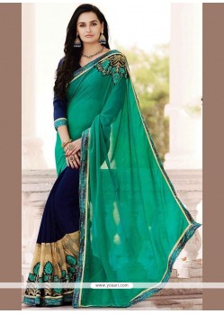 Fashionable Faux Georgette Navy Blue And Sea Green Designer Half N Half Saree