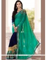 Fashionable Faux Georgette Navy Blue And Sea Green Designer Half N Half Saree