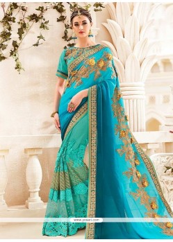 Resham Faux Georgette Designer Half N Half Saree In Sea Green And Turquoise