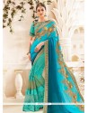 Resham Faux Georgette Designer Half N Half Saree In Sea Green And Turquoise