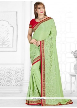 Art Silk Green Embroidered Work Traditional Saree