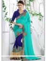 Faux Georgette Blue And Turquoise Patch Border Work Designer Half N Half Saree