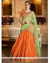 Orange Patch Border Work Art Silk Lehenga Choli