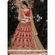 Zari Net Lehenga Choli In Red