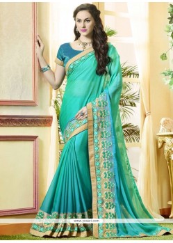 Patch Border Work Blue And Sea Green Faux Georgette Shaded Saree
