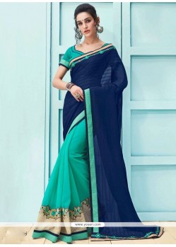 Faux Georgette Navy Blue And Turquoise Lace Work Designer Half N Half Saree