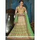 Beige And Green Resham Work Net Lehenga Choli