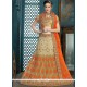 Embroidered Net Lehenga Choli In Orange