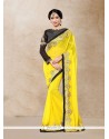 Embroidered Faux Georgette Classic Designer Saree In Yellow