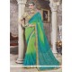 Embroidered Work Blue And Sea Green Faux Georgette Printed Saree