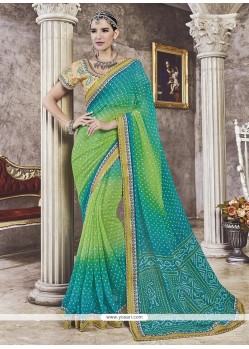 Embroidered Work Blue And Sea Green Faux Georgette Printed Saree