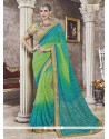 Embroidered Work Blue And Sea Green Faux Georgette Printed Saree