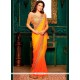 Fancy Fabric Orange And Yellow Shaded Saree