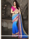 Fancy Fabric Beige And Blue Patch Border Work Shaded Saree