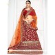 Maroon And Orange Lehenga Choli