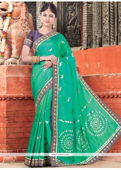 Art Silk Sea Green Embroidered Work Traditional Designer Saree