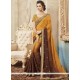 Faux Georgette Brown And Mustard Shaded Saree