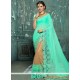 Beige And Sea Green Net Designer Half N Half Saree