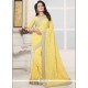 Stone Faux Georgette Designer Saree In Yellow