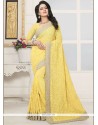 Stone Faux Georgette Designer Saree In Yellow