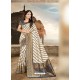 Cream And Navy Blue Shade Printed Silk Saree