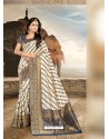 Cream And Navy Blue Shade Printed Silk Saree