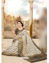 Trendy Cream And Black Printed Saree