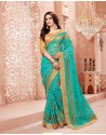 Magnificent Turquoise Net Embroidered Saree