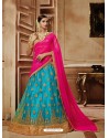 Turquoise Net Embroidered Lehenga Choli