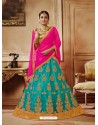 Turquoise Net Embroidered Lehenga Choli