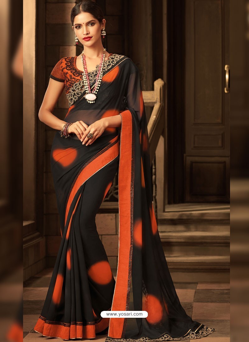 Cupid Trendz Designer Studio - Saree Code:SR 248 Price:RS.4900 Orange color  semi silk Saree with black banarassi border and golden thread worked black  pallu. Blouse Material: Black brocade . To order whatsapp