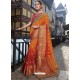 Orange And Red Raw Silk Designer Woven Saree