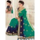 Teal And Navy Blue Raw Silk Woven Designer Party Wear Saree