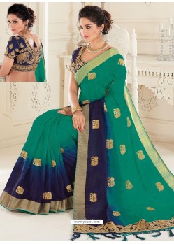 Teal And Navy Blue Raw Silk Woven Designer Party Wear Saree