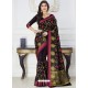 Decent Black Raw Silk Designer Woven Saree