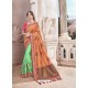Rust And Green Heavy Embroidered Silk Wedding Saree