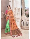 Rust And Green Heavy Embroidered Silk Wedding Saree