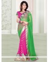 Eyeful Pink And Green Net Designer Saree