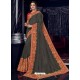 Carbon Silk Fabrics Heavy Embroidered Party Wear Saree