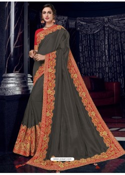 Carbon Silk Fabrics Heavy Embroidered Party Wear Saree