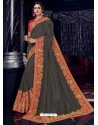 Carbon Silk Fabrics Heavy Embroidered Party Wear Saree