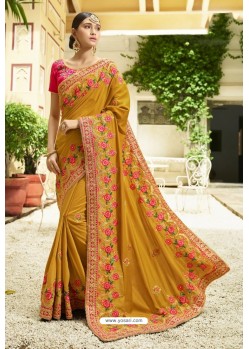 Mustard Muslin Embroidered Party Wear Saree