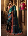 Teal And Navy Cadbury Silk Heavy Embroidered Wedding Saree